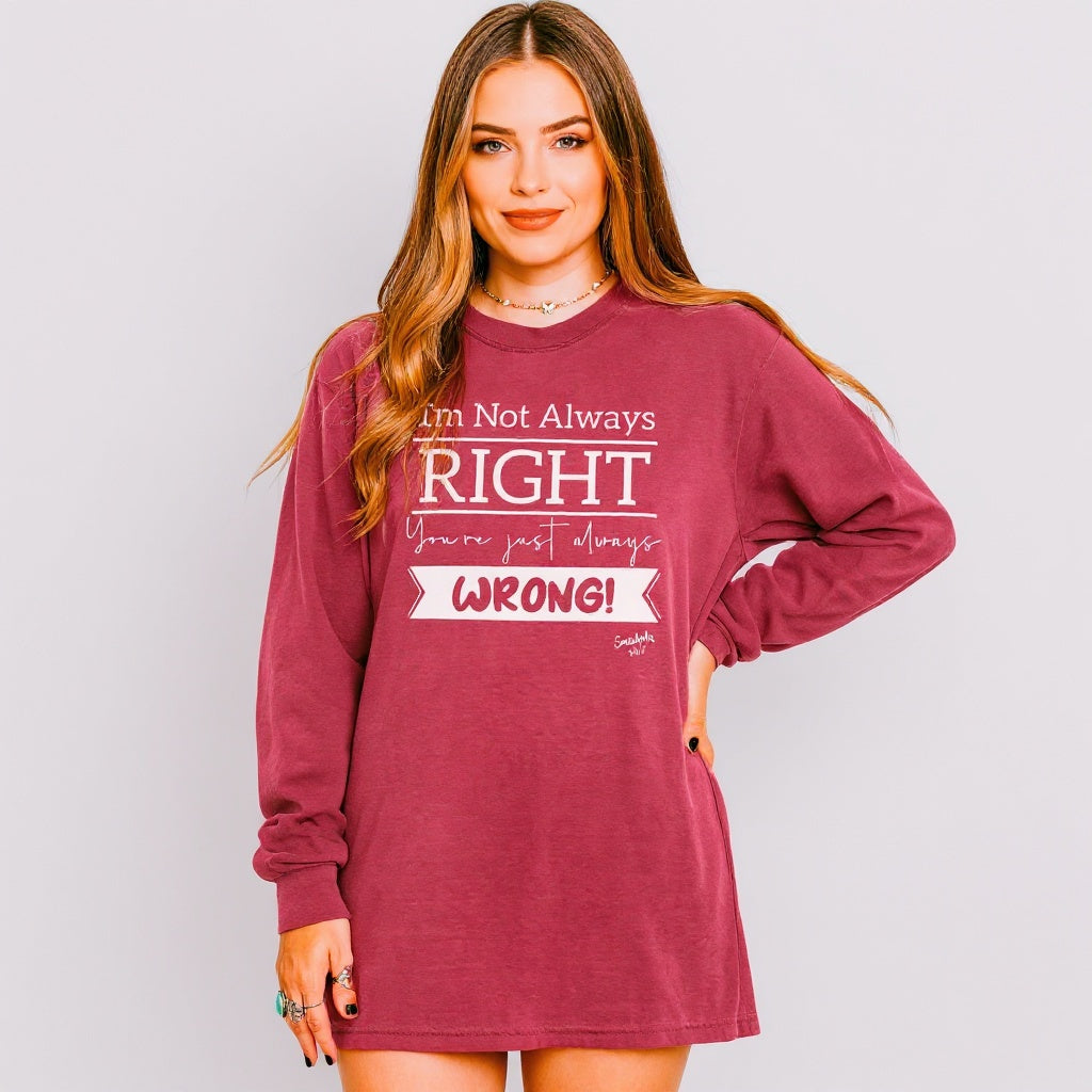 Image of Woman wearing a maroon long-sleeve dress with text on a plain background