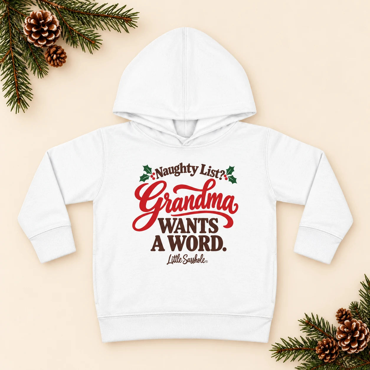 Image of Naughty List? Grandma Wants a Word. — Toddler Hoodie — festive product flat lay