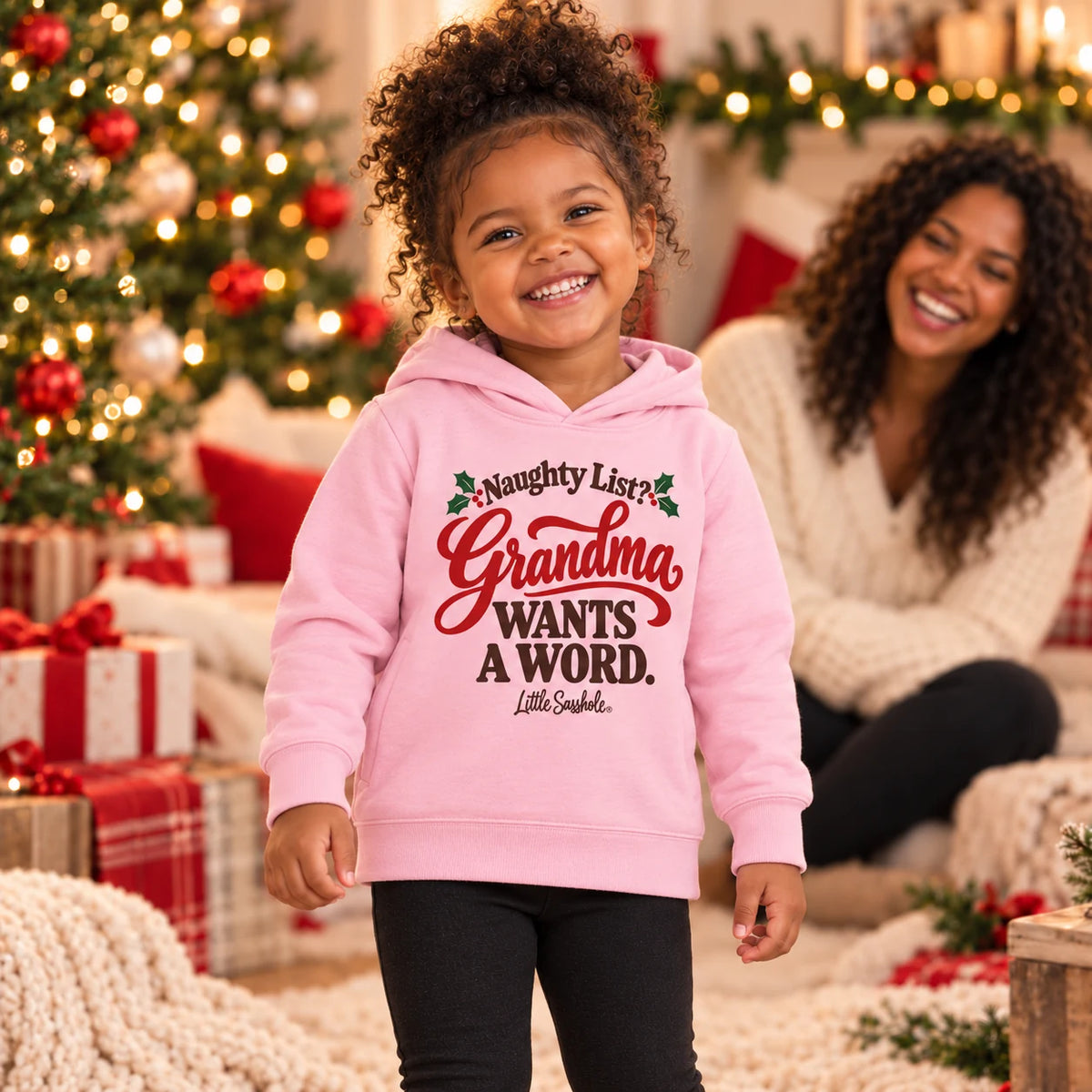 Naughty List? Grandma Wants a Word. — Toddler Hoodie — toddler wearing the Pink garment at Christmas