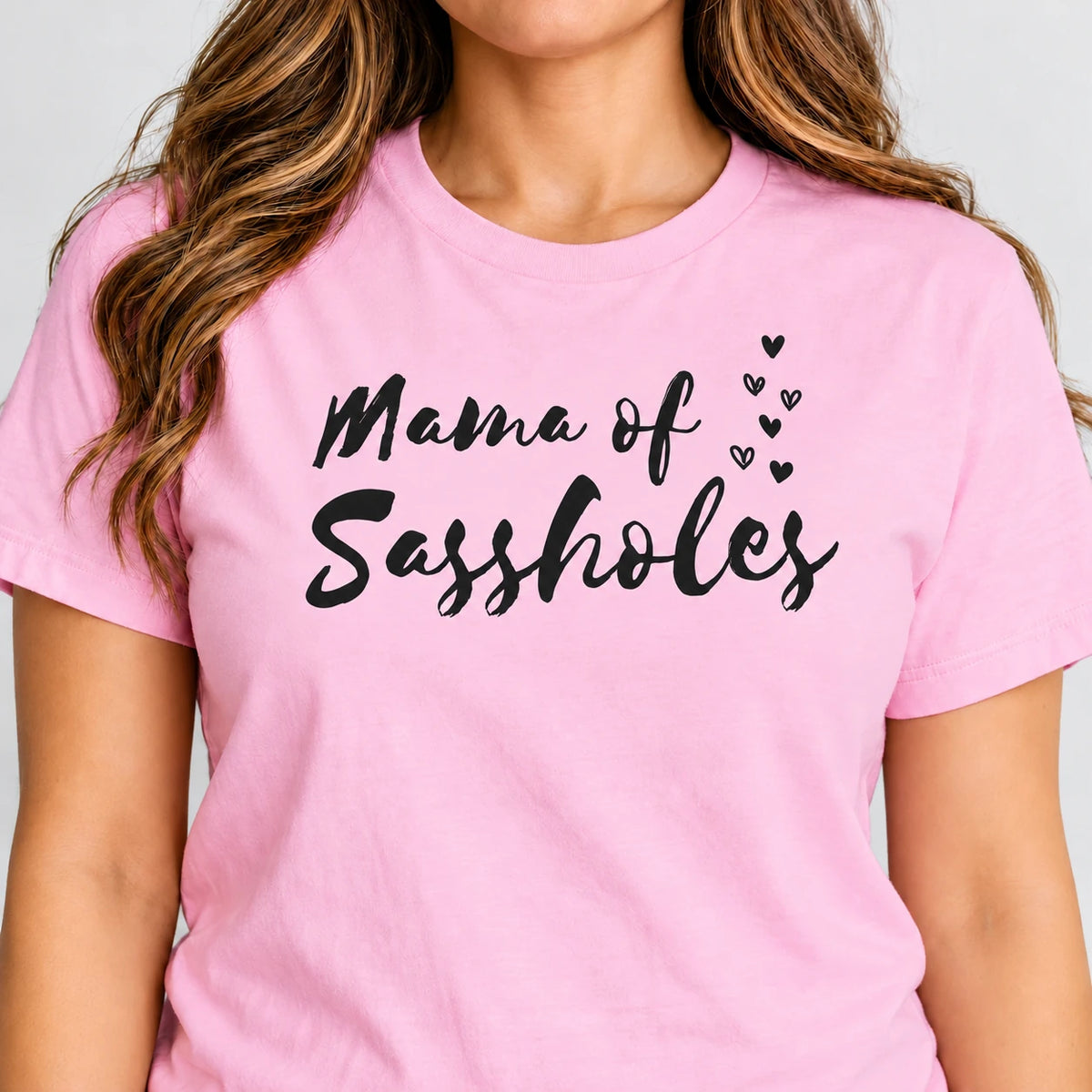 Mama of Sassholes print close-up on Pink jersey.