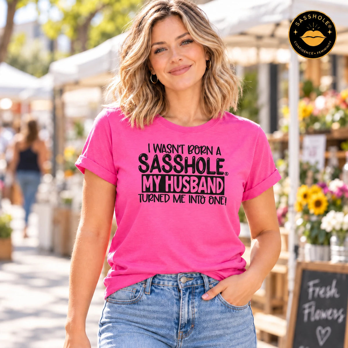 I Wasn’t Born a Sasshole, My Husband Turned Me Into One! tee in Charity Pink, outdoor lifestyle view.